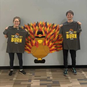 Retention-Focused Fitness Challenges team picture with shirts